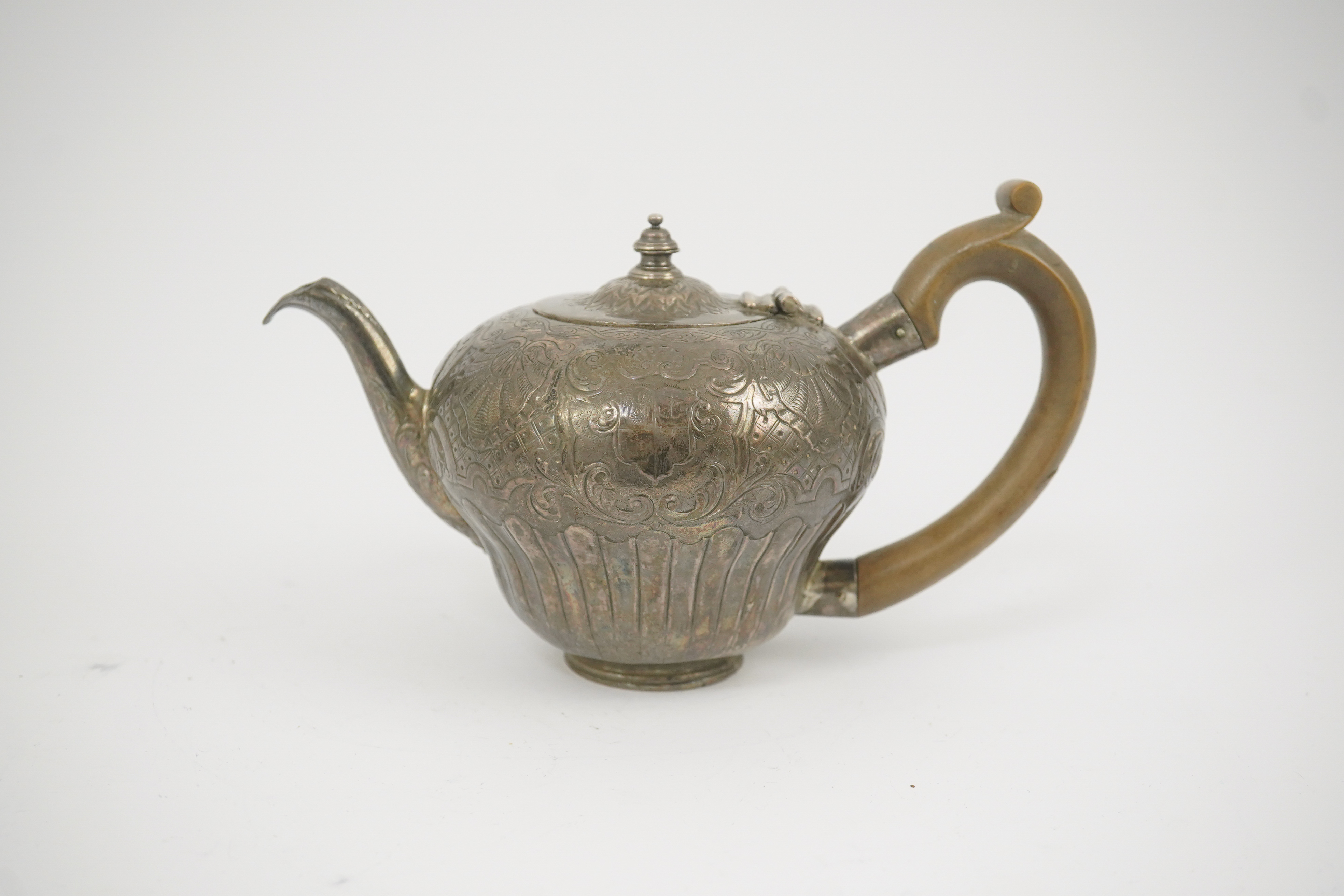 An 18th century Irish silver inverted pyriform bachelor's teapot, maker E.R